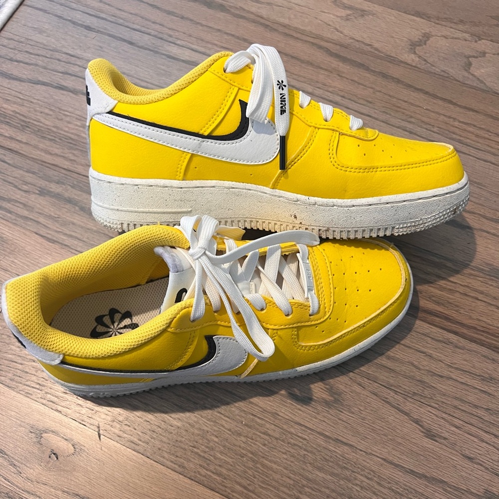 Nike women’s yellow sneakers. Size 6 youth, which is 8 in womens
